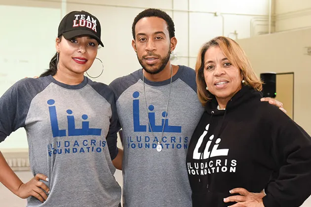 The Ludacris Foundation team wearing matching Ludacris Foundation shirts.